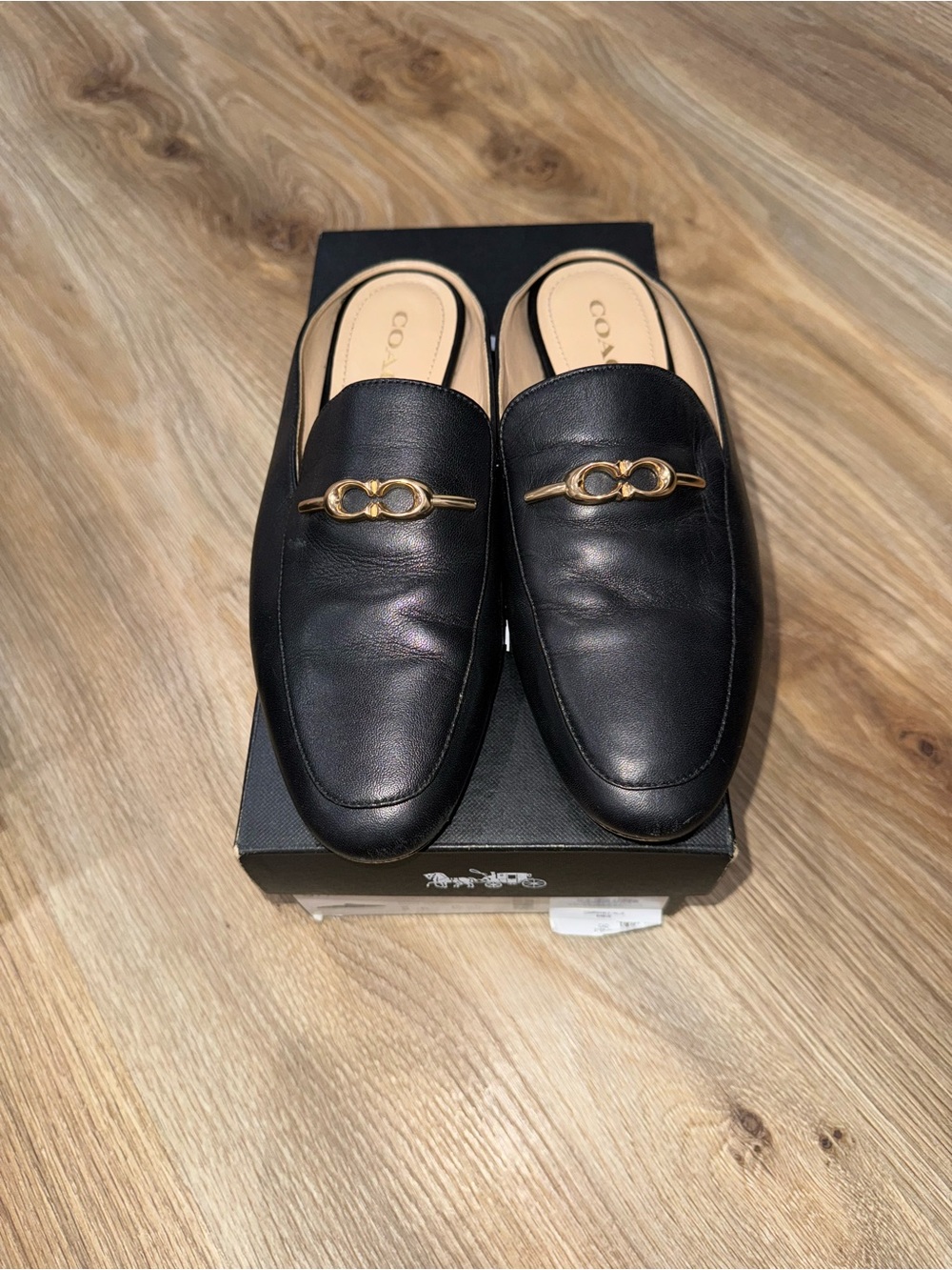 Coach Women’s Black Leather Backless Loafers with Gold Horsebit